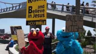 Cookie Monster and Elmo with Religious Protesters at SDCC 2012