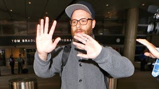 Seth Rogen Gets Handsy With Photographers At LAX