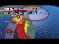 Tropical Depression 4 is entering the Gulf, inching closer to Florida