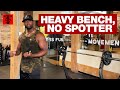 How to Bench Press Heavy Without a Spotter