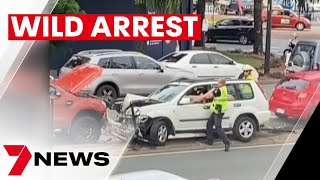 Queensland police officer punches and tasers man during arrest at Strathpine | 7NEWS