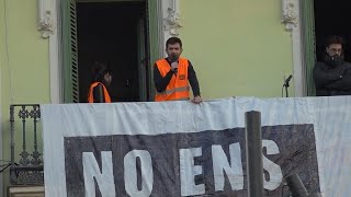 Angry protesters try to stop eviction of resident from iconic apartment building in Barcelona