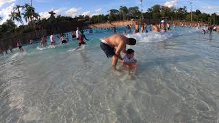 Kayden and Dad in the Typhoon Lagoon wave pool