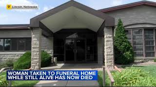 Woman who started breathing at funeral home has now died