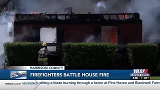 Fire crews responding to devastating Harrison Co. house fire