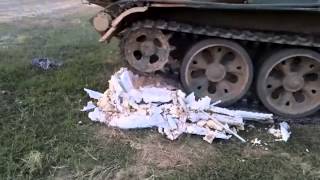 Tank crushing a fridge freezer