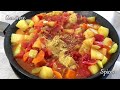 vegetable stew with sausages in a pan