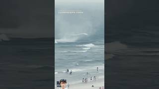 Footage captures waterspout ripping through crowded beach #Shorts #usa