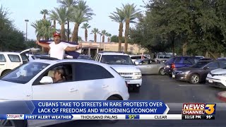 Residents hold caravan to show support for Cuban protesters