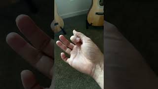 Don’t hold the guitar pick like this