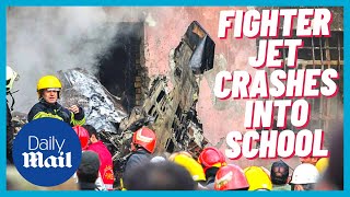 Iran military jet crash: Three people killed after jet crashes into school and bursts into flames