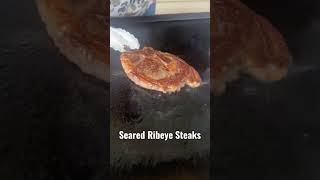 Seared Ribeye Steaks on the Blackstone Griddle.