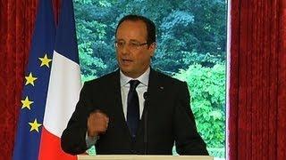 Hollande urges talks to resolve EU-China trade row