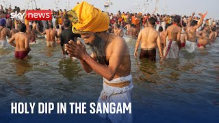 Devotees in India gather at the Maha Kumbh festival to take the holy bath