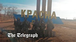 Ukraine war: Russia's Wagner mercenaries pose at entrance to 'captured' village near Bakhmut