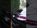 how to manually raise the porsche taycan spoiler