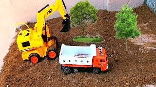 Demo Mini Rc excavator working on construction site  mini house land preparing