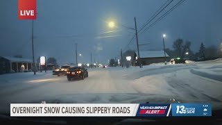 Overnight snow causes slippery road conditions
