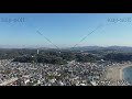 ドローン空撮映像・由比ガ浜海岸・鎌倉市街地・右旋回・八幡宮～逗子マリーナ