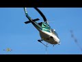 alberta helibucket performing multiple refill runs back and forth 5 14 2023