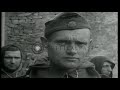 U.S. Army soldiers guard German SS-Totenkopfverbände (SS-TV) prisoners...HD Stock Footage