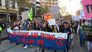 Australian school children cut class to renew climate protest | AFP