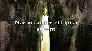 Vi tänder ett ljus i advent med text