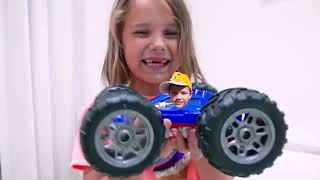 Max and Katy ride on Toy Cars