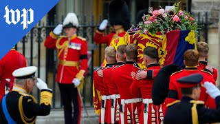 King Charles III escorts queen's coffin to funeral