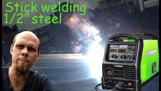 harbor freight welder welding on new skid steer cutting edge and hardfacing