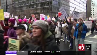 People march in Burlington ahead of Presidential Inauguration