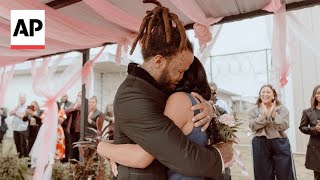 Louisiana prison reunites prisoners with their daughters at father-daughter dance