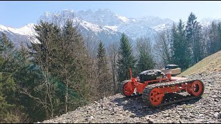 Remote controlled alpine steep slope mower meadow trial Switzerland