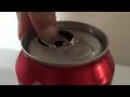 the proper way to open a coca cola can