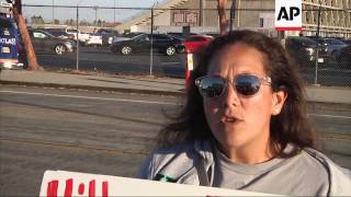 Supporters, Opponents Outside Clinton Event