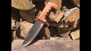 Survival Bowie knife in the making .