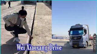 The journey is 4,000 km long. Female trailer truck driver Wei Xiaoxang.