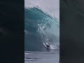 Big surge caught a surfer and nearly a jetski! Insane ride!