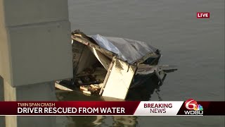 Car trapped under truck in Lake Pontchartrain near New Orleans