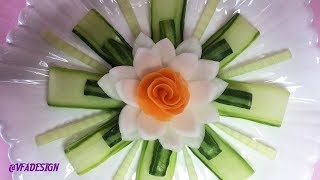 Attractive Carrot Rose Laying On Onion Lotus Flower With Beautiful Cucumber Crafting Designs.