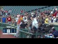 min@cle mauer reaches into stands to make the catch