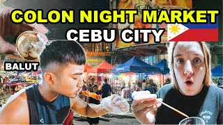 British Couple tries FILIPINO STREET FOOD in COLON NIGHT MARKET CEBU -  BALUT and TUSLOB BUWA🇵🇭