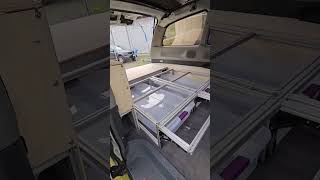 Stretch Previa camper interior set up