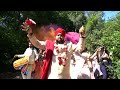 colourful indian at wedding nunsmere hall uk