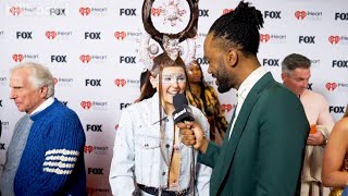 Jojo Siwa On Viral Gay Pop Statements, Etsy Inspired Outfit & More | iHeartRadio Music Awards 2025