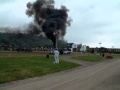 Nice big black stack Tractor pulling massive engine explosion on the day