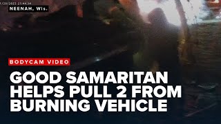 Bodycam video of a dramatic rescue from a burning vehicle in subzero temperatures