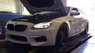 2014 BMW M6 Twin Turbo puts down 700 whp and 750 ft lbs of torque with 4 mods