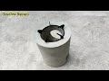 the idea of making a wood stove from cement and a plastic bucket at home