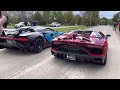 bugatti chiron pur sport races lamborghini aventador svj roadster